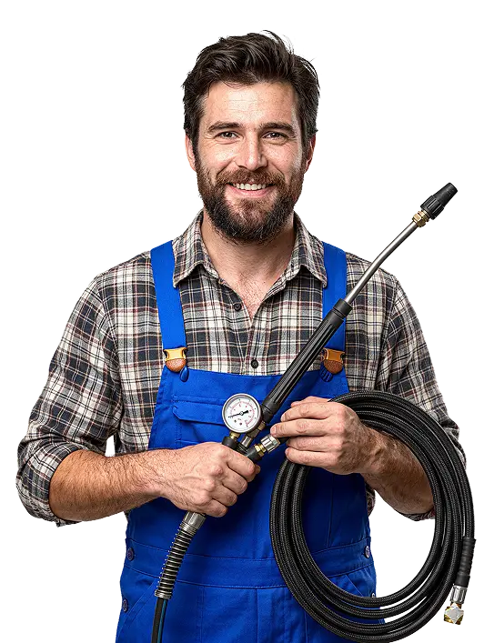 Smiling Ez Flow Hydrojetting professional wearing blue overalls holding a high pressure wand and coiled hose.